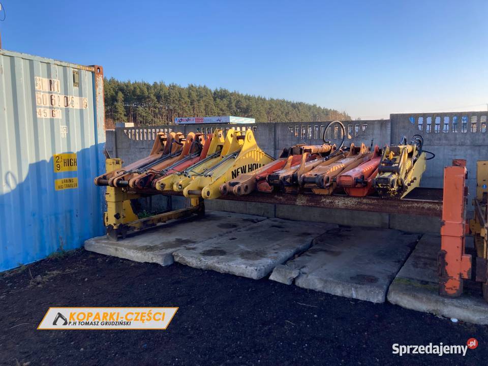 Ramię główne Holland LB 110 115 stan idealny