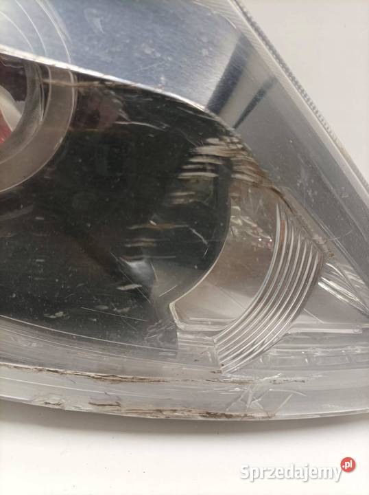 LAMPA PRZÓD PRAWA XENON USZKODZONA 921023U290