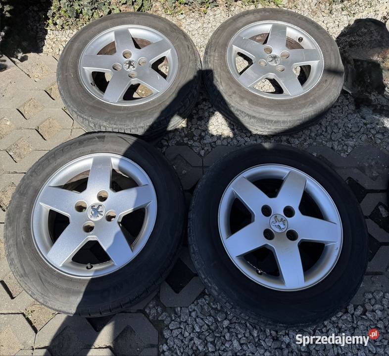 Felgi Peugeot 4x108 opony 1856515 2023r 206 207 Krępiec sprzedam