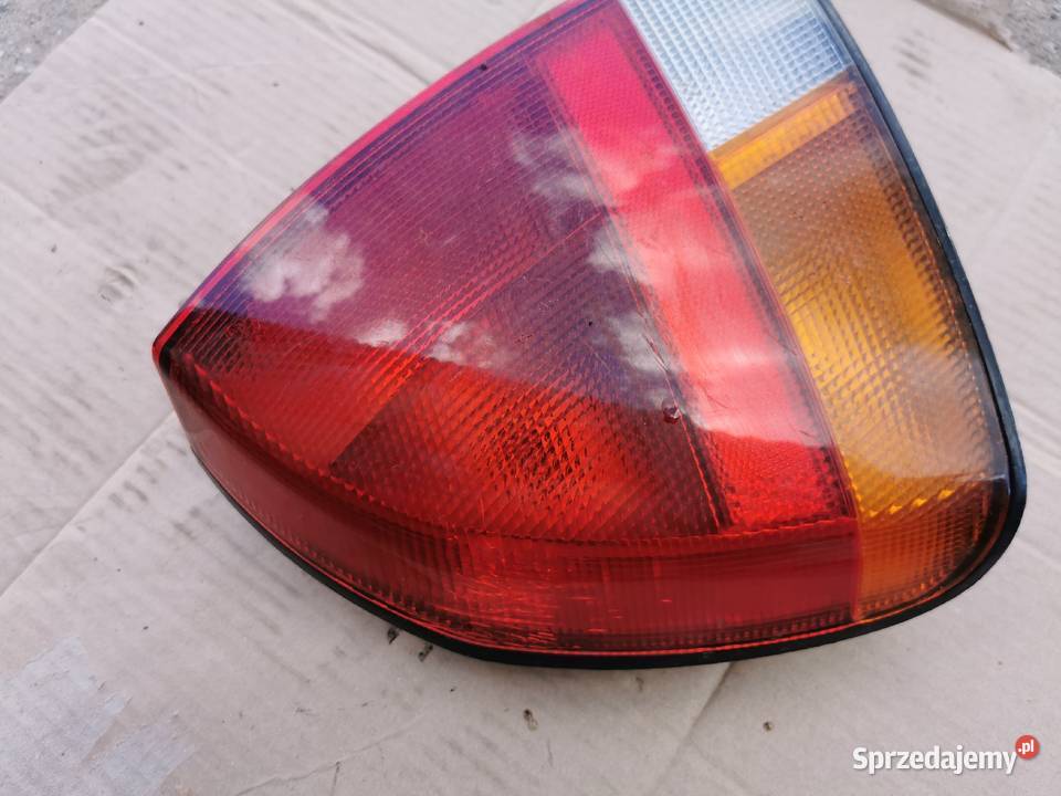 Lampa lewa tył tylnia mitsubishi Carisma hb 5d Międzychód