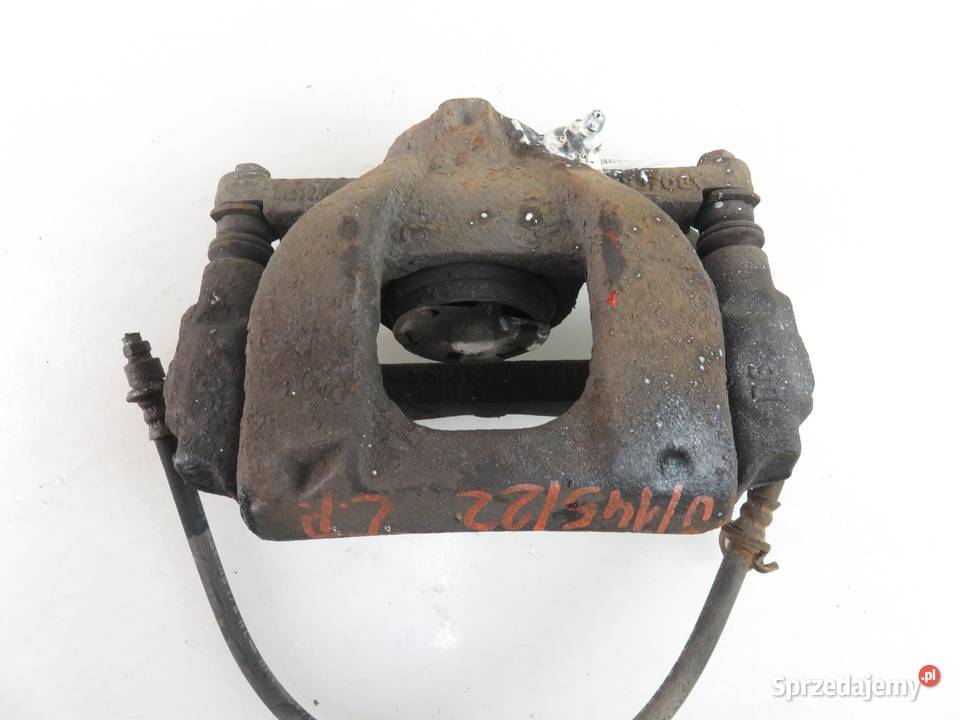 ZACISK LEWY PRZÓD TOYOTA AURIS E15