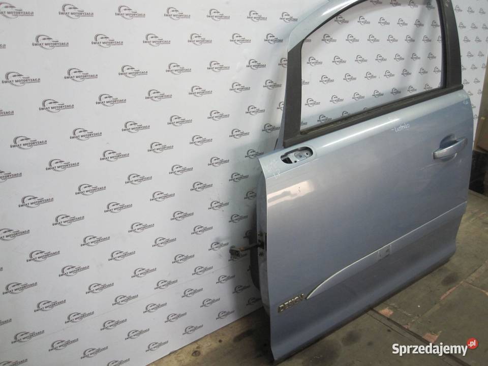 OPEL CORSA D 07r drzwi lewe przód
