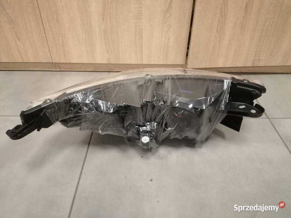 Citroen C4 b7 reflektor lewy przód Oświetlenie lubelskie Kozubszczyzna