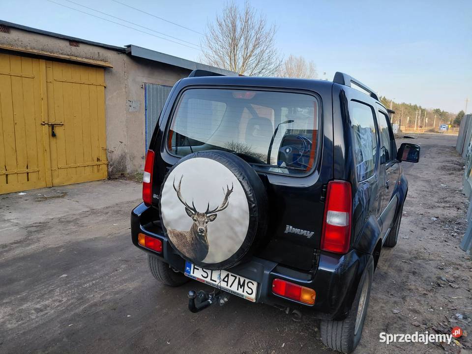 Suzuki Jimny 13 Elegance Rok produkcji 2011 Motoryzacja