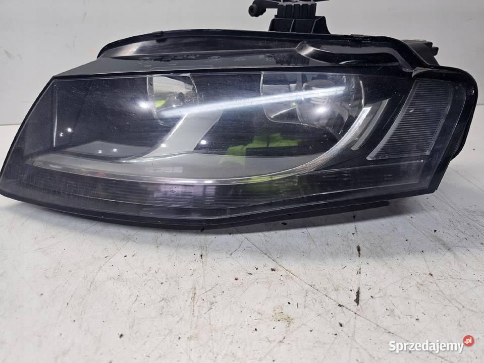 REFLEKTOR LEWY PRZÓD AUDI A4 B8 8K0941003A OK Przystajń