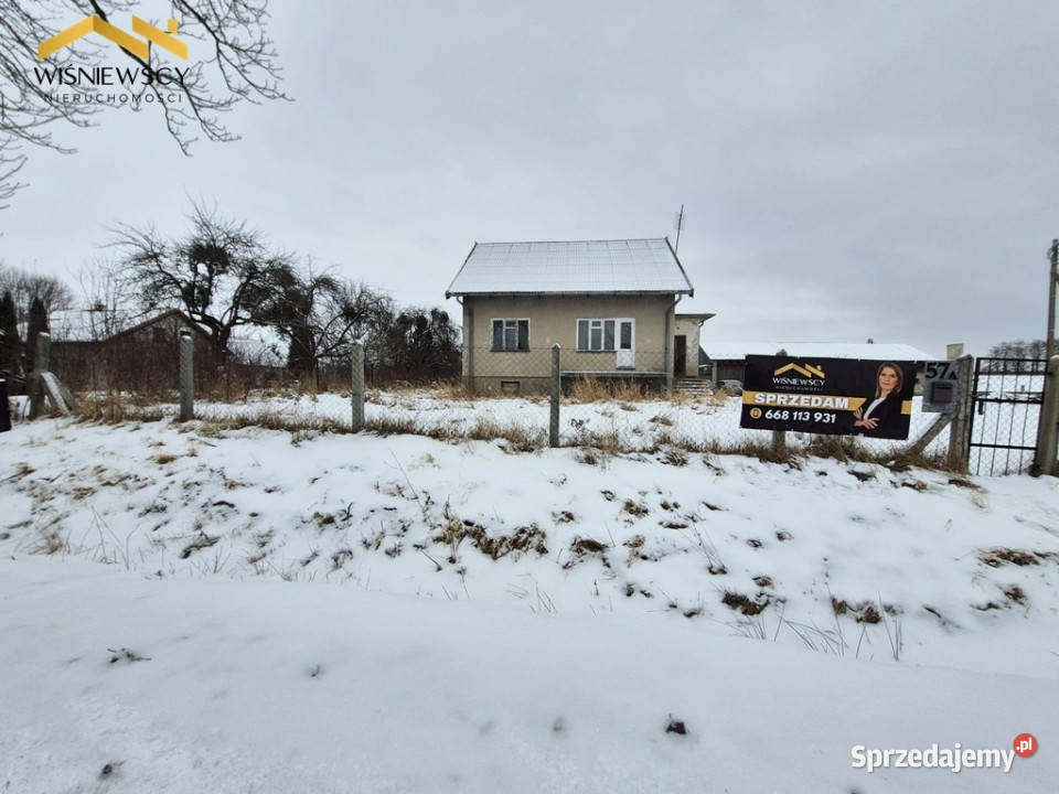 Rogity dom do remontu z zabudowaniami siatka