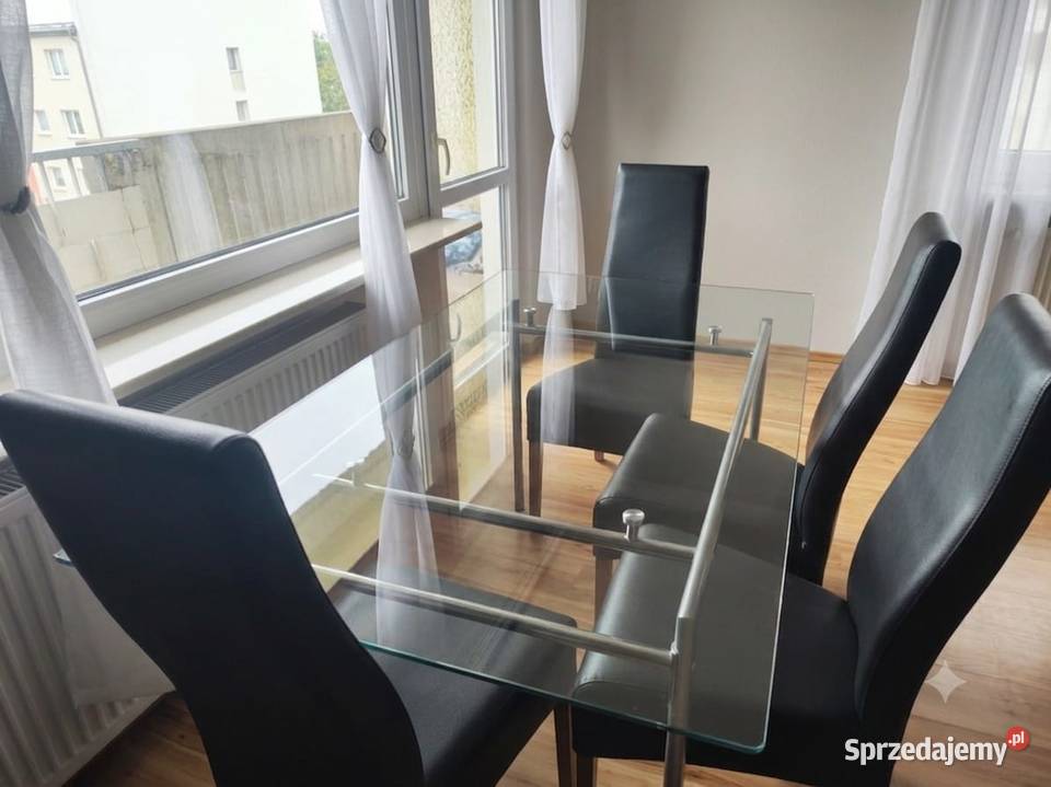 Zestaw stół szklany i 4 eleganckie czarne Suwałki