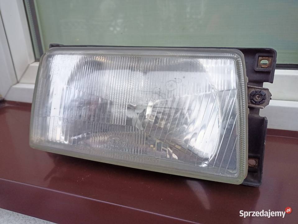 VW Polo III 86c2f lampa przednia prawa reflektor osobowe Sieradz