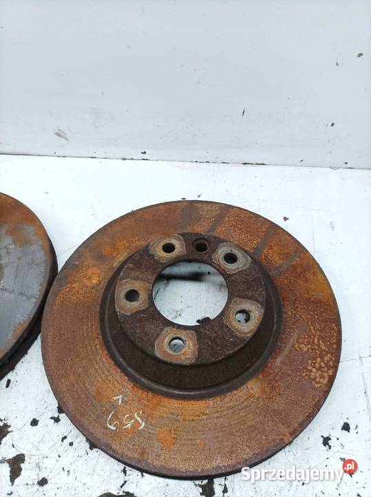 ZACISK HAMULCOWY PRAWY LEWY PRZÓD BREMBO TARCZE