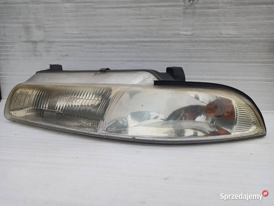 Chrysler Stratus lampa przednia lewa reflektor Oświetlenie Sieradz