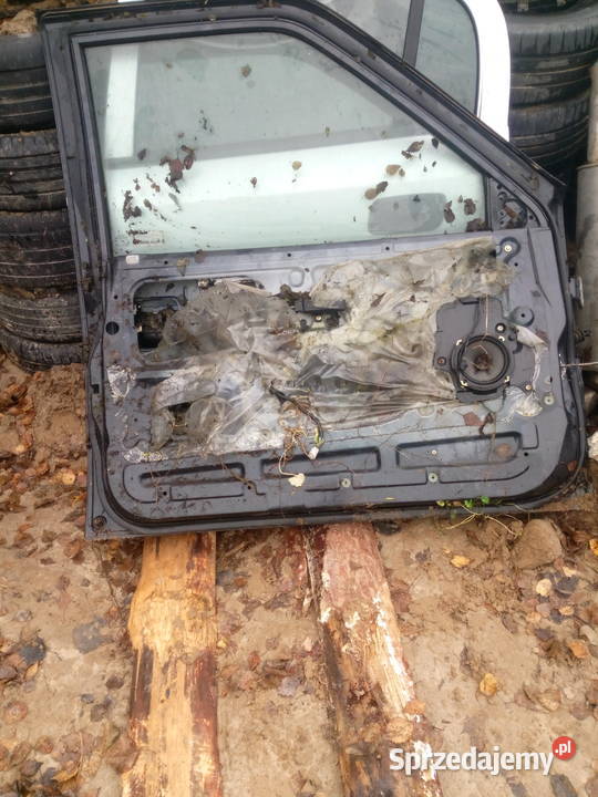 Opel Frontera a drzwi lewy przód części blacharskie sprzedam
