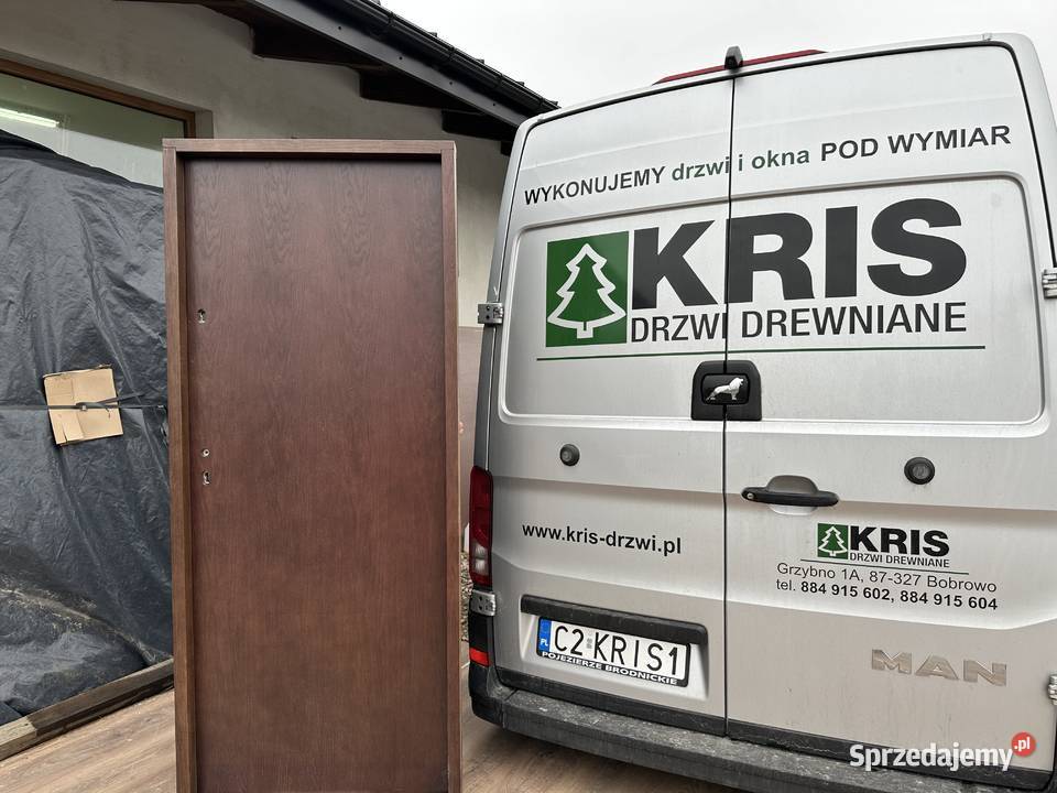 Drzwi zewnętrzne wewnątrzklatkowe drewniane Na 98cm Grzybno