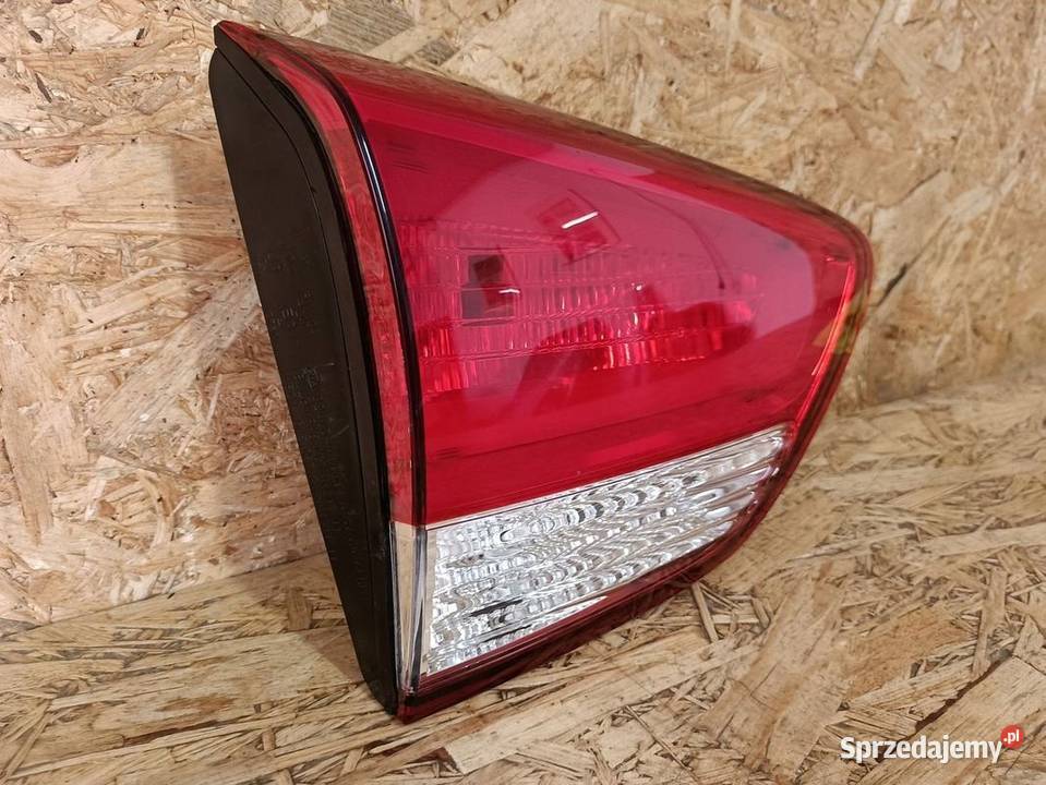 KIA CARENS IV LAMPA W KLAPĘ LEWY TYŁ 92403A4010 osobowe wielkopolskie Pleszew