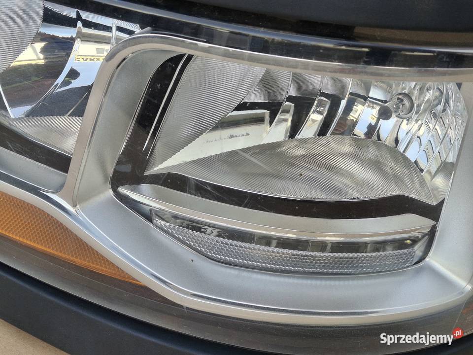 SCANIA R S REFLEKTOR LEWY H7 LAMPA LEWA RAMKA Bieleń