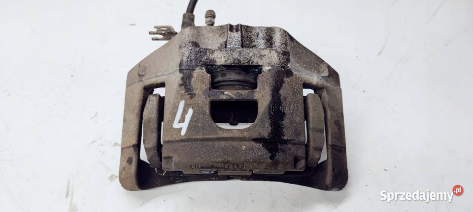ZACISK HAMULCOWY JARZMO LEWY AUDI A6 C6 973