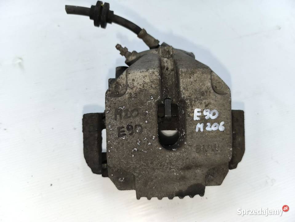 ZACISK LEWY PRZÓD KOMPLETNY BMW E90 E91