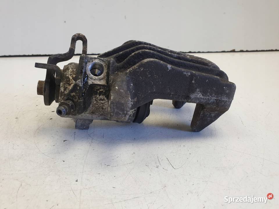 VW Golf IV LEWY ZACISK HAMULCOWY tył KIEROWCY Janów