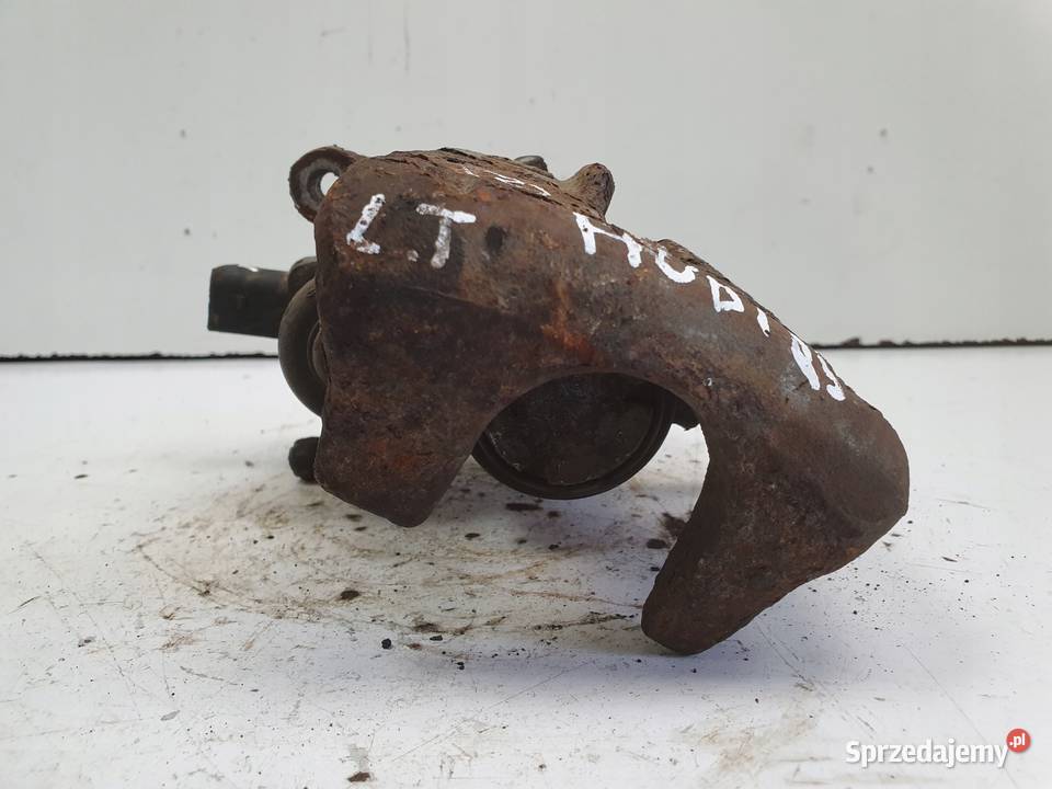 Audi Q5 TYLNY ZACISK HAMULCOWY lewy tył PASAŻERA Układ hamulcowy Janów