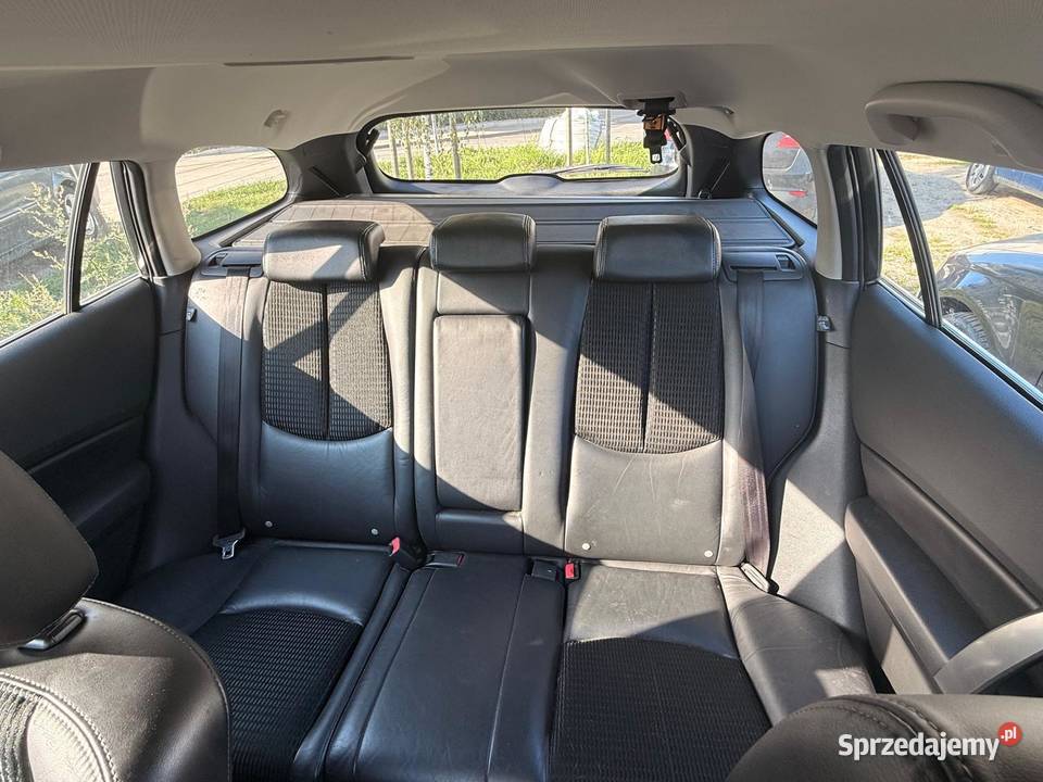 Mazda 6 20 benzyna 2009 132 265 Czarna 25 000 Warszawa