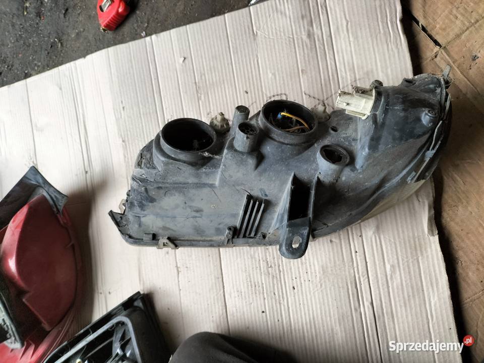 LAMPA PRZÓD PRZEDNIA PRAWA REFLEKTOR OPEL OMEGA Oświetlenie Kamień-Kolonia
