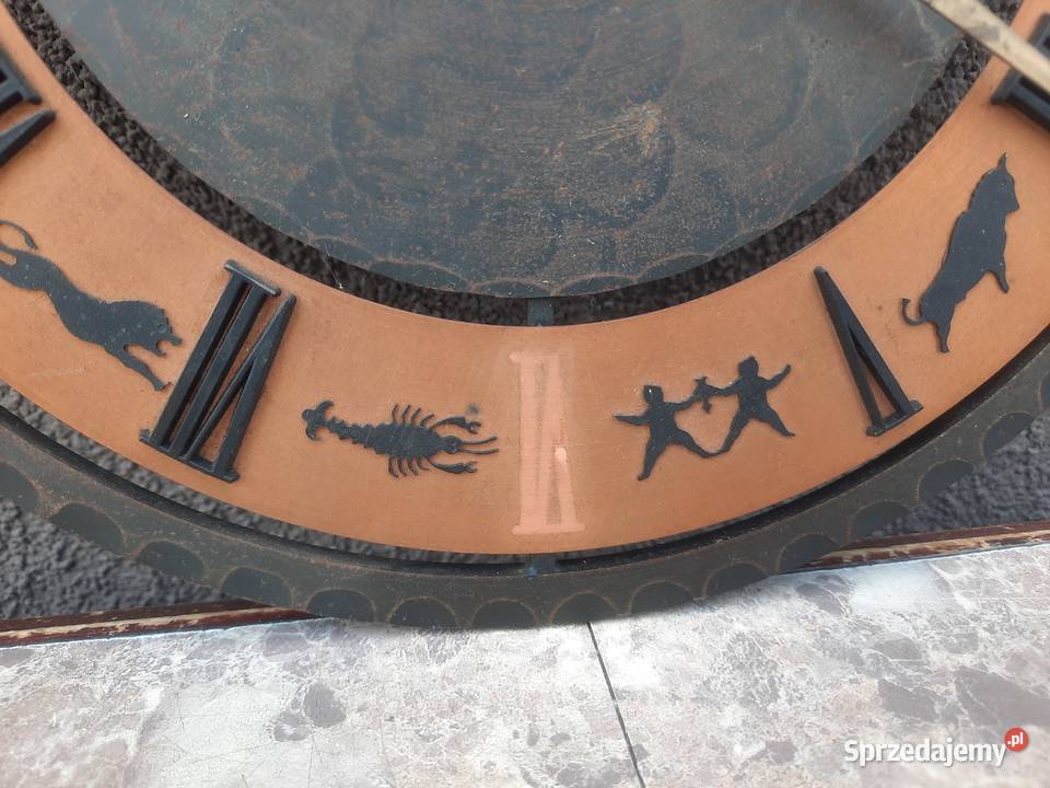 Q23 Zegar ścienny Kienzle znaki zodiaku W276 Ato