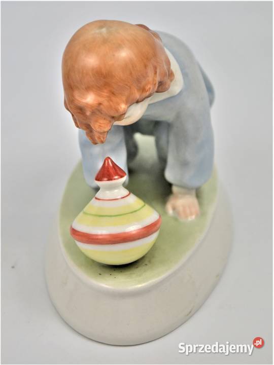 dziecko bawiące się bączkiem projekt Sinko Warszawa