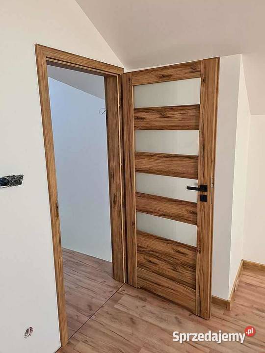 DRZWI MONTAŻ OŚCIEŻNICE REGULOWANE 788 449 440 Drzwi wewnętrzne