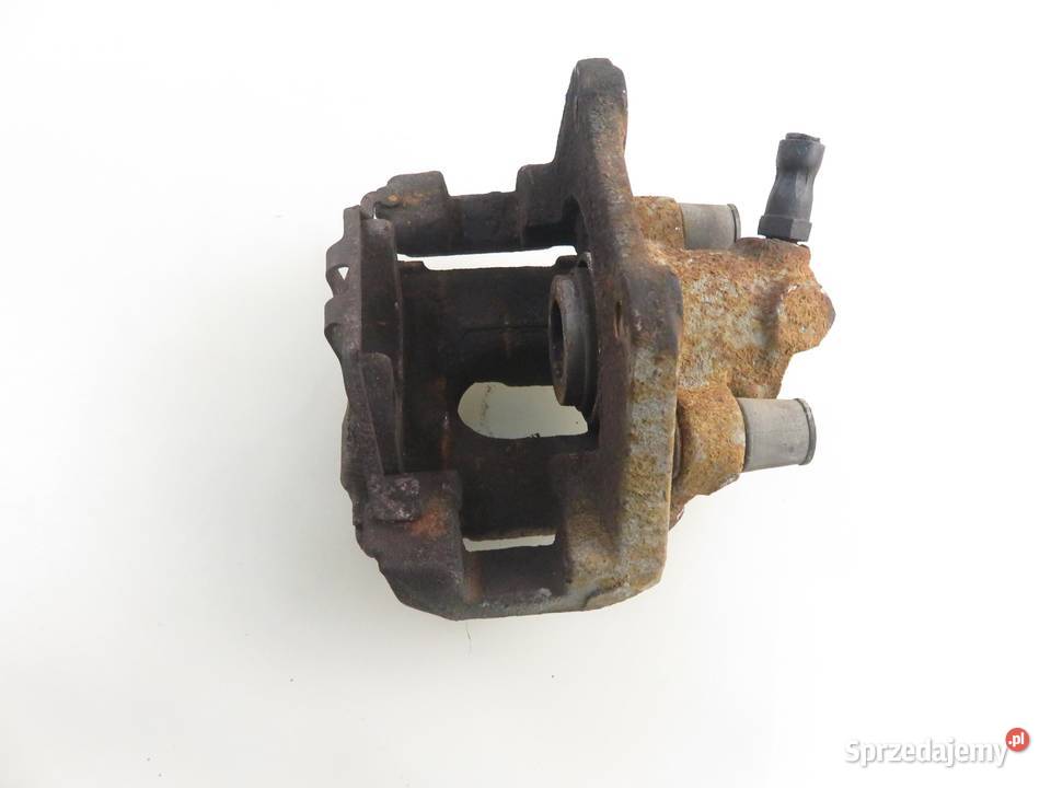 ZACISK LEWY TYŁ BMW X3 E83 20 d 150 M47 D20