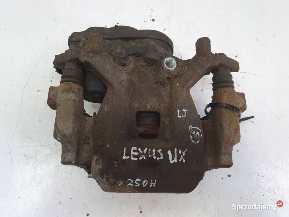 Lexus UX TYLNY ZACISK HAMULCOWY lewy tył