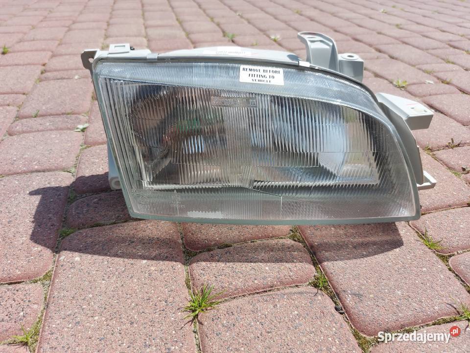 Lampa reflektor przód prawa toyota Carina e lampy przednie Sędziejowice