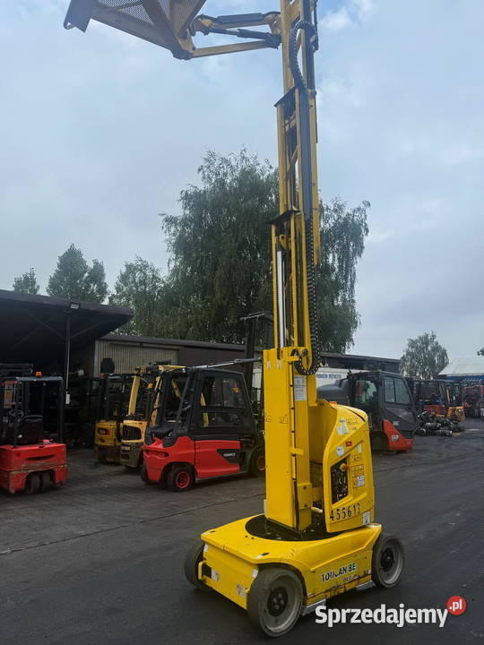 zwyżka podnośnik słupowy obrotowy JLG TOUCAN 8E Dźwigi, podnośniki