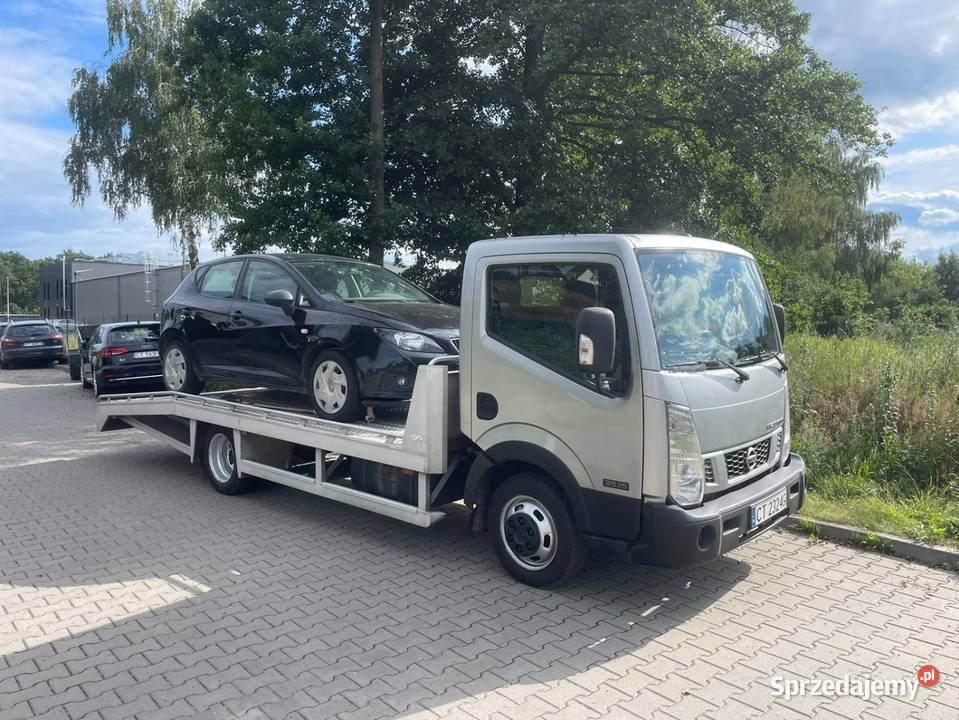 Transport pojazdów laweta pomoc drogowa kujawsko-pomorskie Toruń usługi moto
