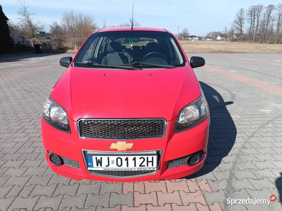 Chevrolet Aveo 12 16V 84 2010r czerwony Tłuszcz