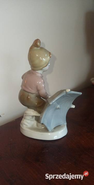 Figurka chłopca z parasolem Syg Import i 646 pomorskie