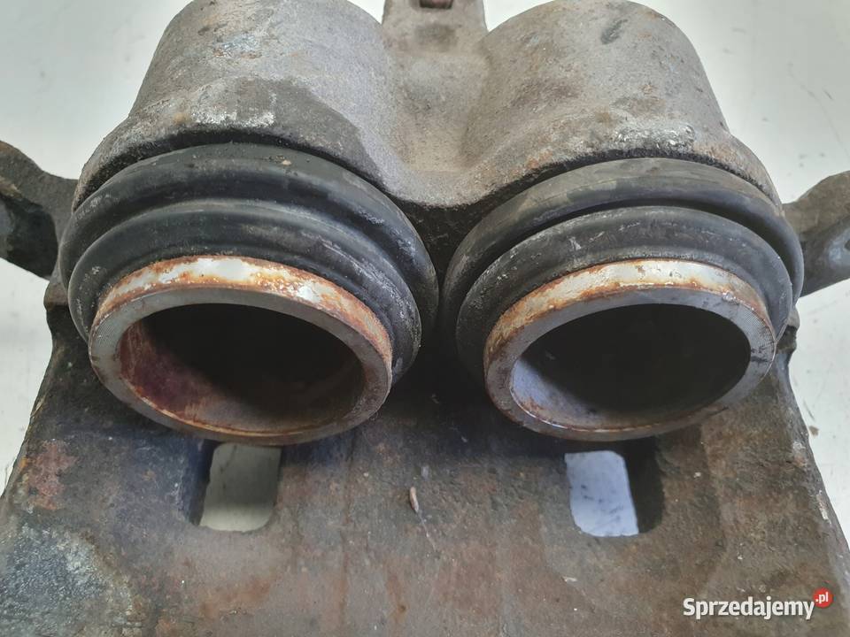 Nissan XTrail T30 PRZEDNI ZACISK HAMULCOWY lewy Motoryzacja Rudka