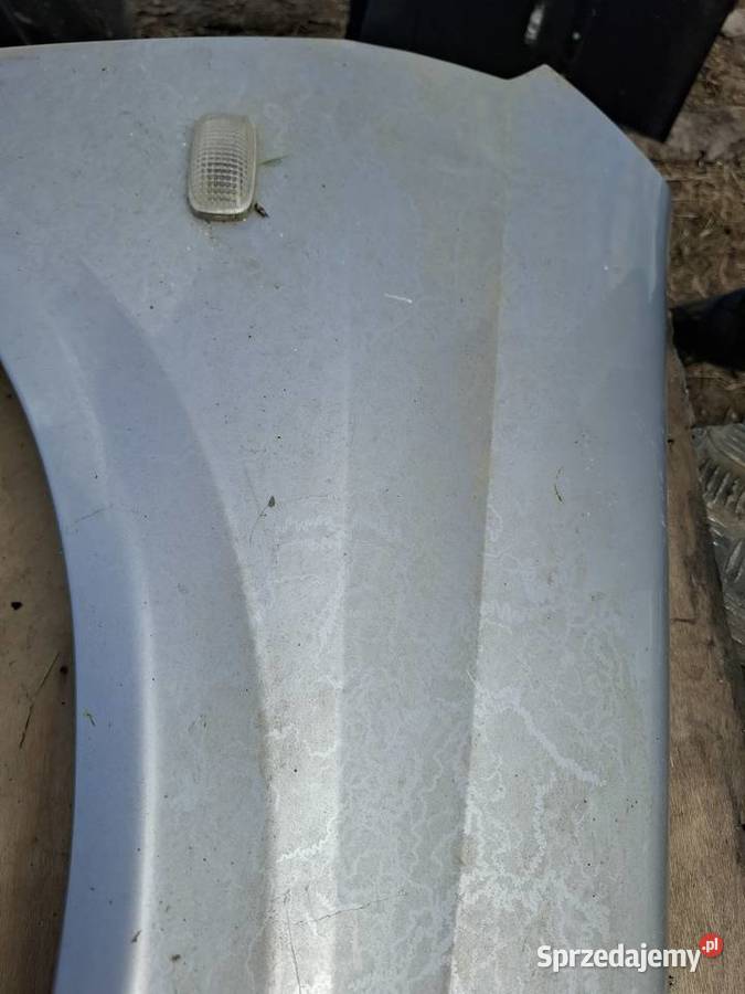 Błotnik Prawy Przód Nissan Priemera osobowe lubelskie Wisznice sprzedam