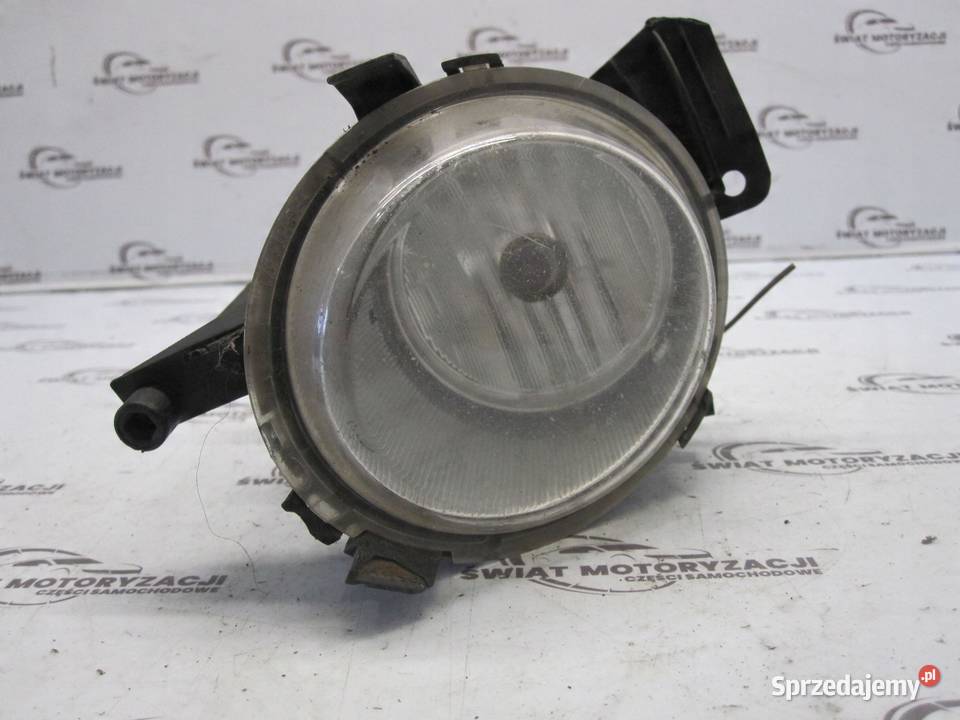 OPEL CORSA D halogen lewy 13262573