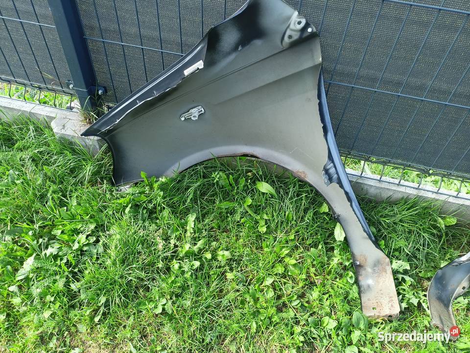 Błotnik prawy lewy Toyota Yaris P1 9905 kod mazowieckie Warszawa