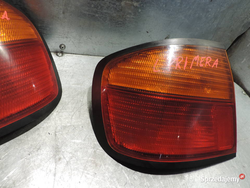 NISSAN PRIMERA P11 HB LAMPA LEWY TYŁ osobowe Motoryzacja Nowy Sącz
