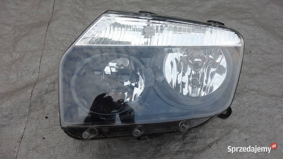 REFLEKTOR LEWY LAMPA LEWA PRZÓD DACIA DUSTER I Ruda Śląska