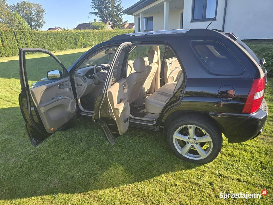 KIA SPORTAGE II 20 140 ACTIVE JASNE SKÓRY relingi dachowe Goździk