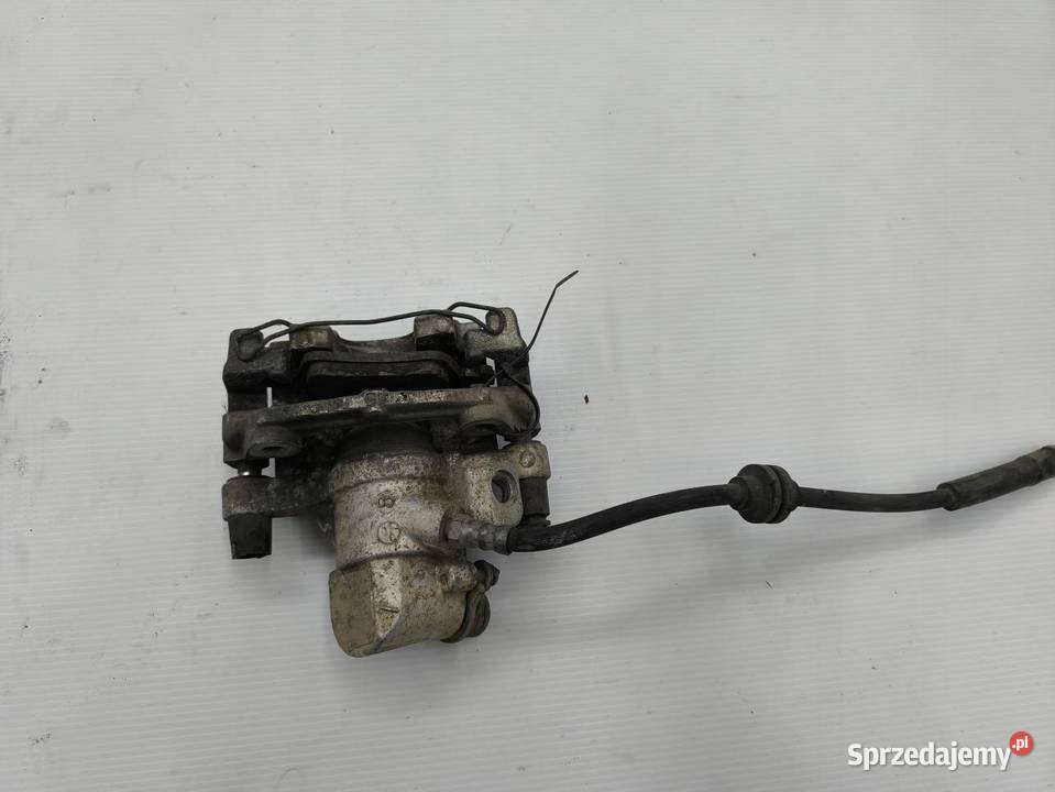 ZACISK HAMULCOWY LEWY TYŁ FORD FOCUS MK3