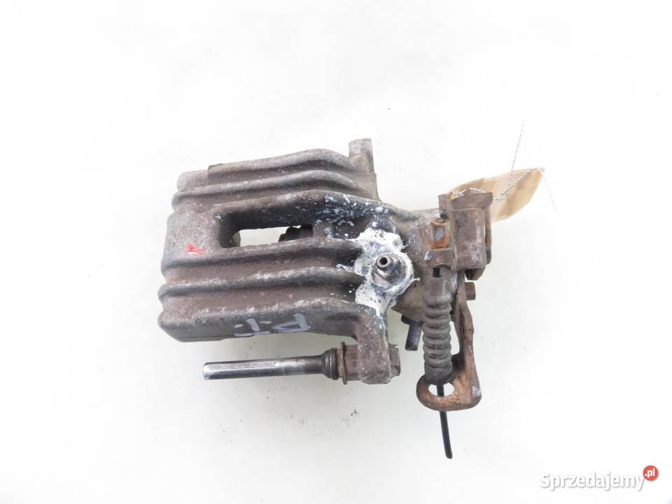 ZACISK PRAWY TYŁ VW PASSAT B5 19 TDI