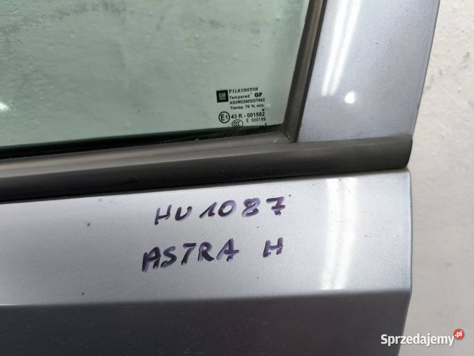 DRZWI LEWY PRZÓD Z163 OPEL ASTRA H KOMBI osobowe