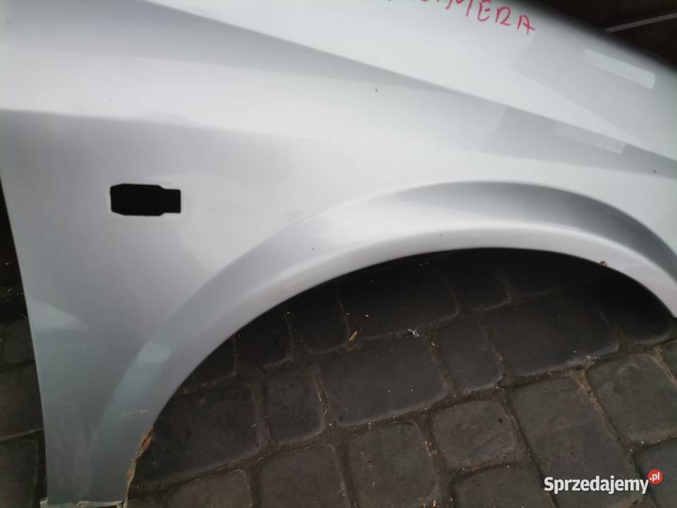 NISSAN PRIMERA P12 BŁOTNIK PRAWY PRZEDNI KY0G Rok produkcji 2005 Błotniki małopolskie Nowy Sącz