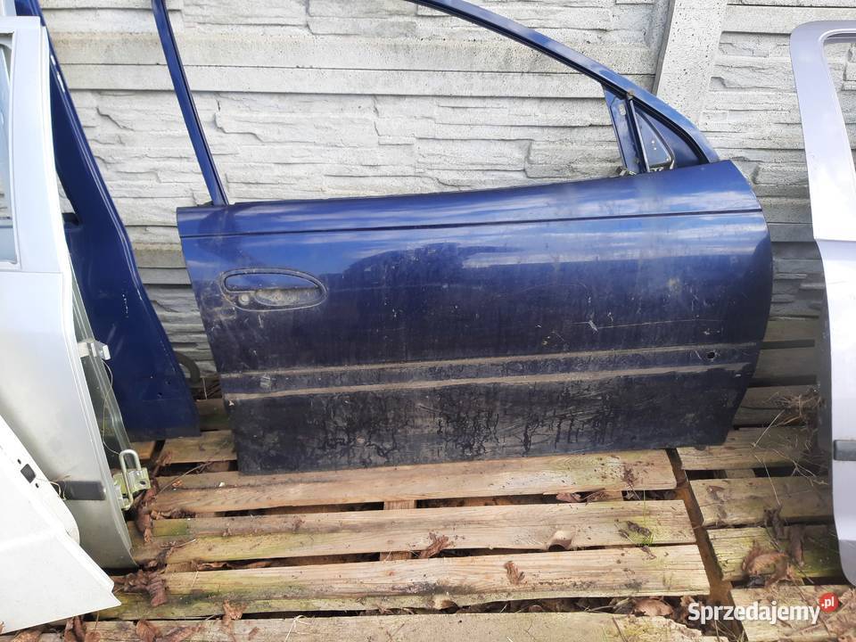 Opel Omega B prawe przednie prawy przód drzwi Ksawerów