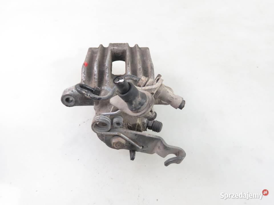 ZACISK PRAWY TYŁ VW GOLF V 1K1 19 TDI BXE