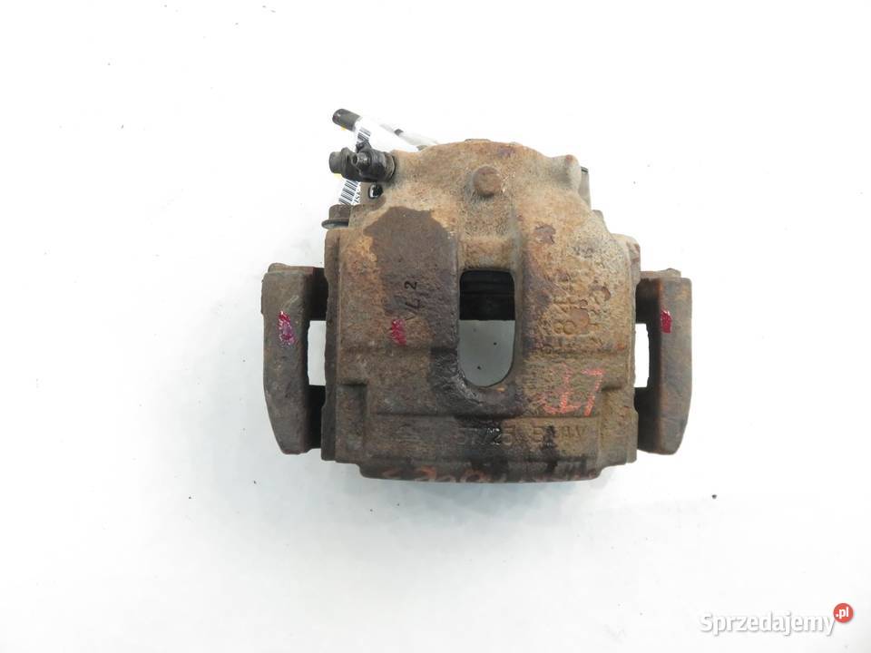 ZACISK LEWY PRZÓD BMW X3 E83 20 d