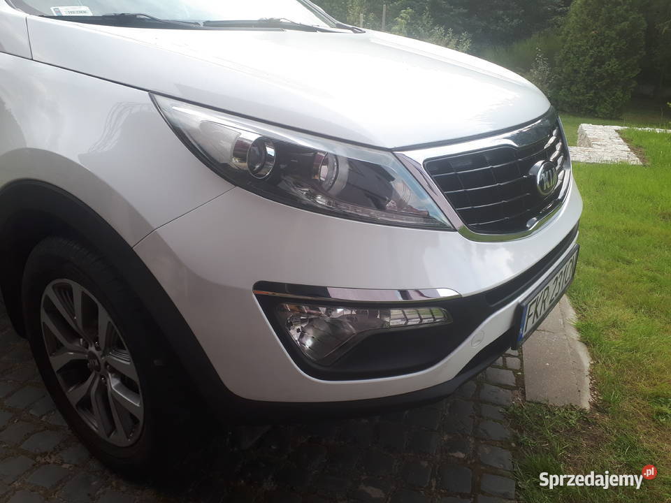Kia Sportage 16 benzyna Biala perła komplet opon pełny VAT Sportage Połupin sprzedam