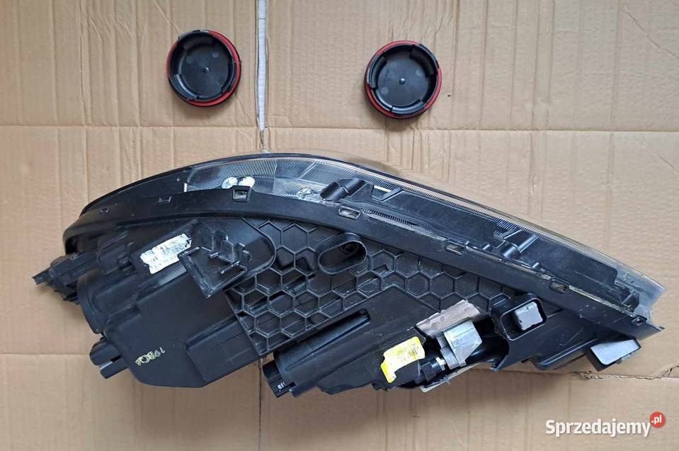 Uszkodzony reflektor lampa 92102 G4060 prawy Łódź